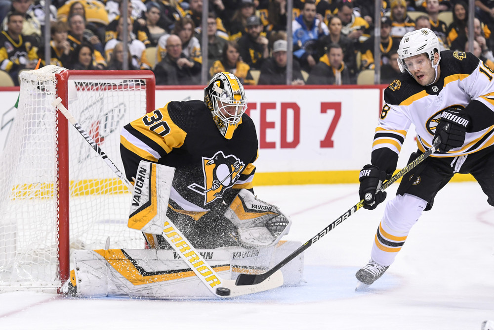 PITTSBURGH, PA - MARCH 10: Pittsburgh Penguins Goalie Matt Murray (30) makes a save with Boston Bruins Right Wing Lee Stempniak (18) in front during the first period in the NHL game between the Pittsburgh Penguins and the Boston Bruins on March 10, 2019, at PPG Paints Arena in Pittsburgh, PA. (Photo by Jeanine Leech/Icon Sportswire)